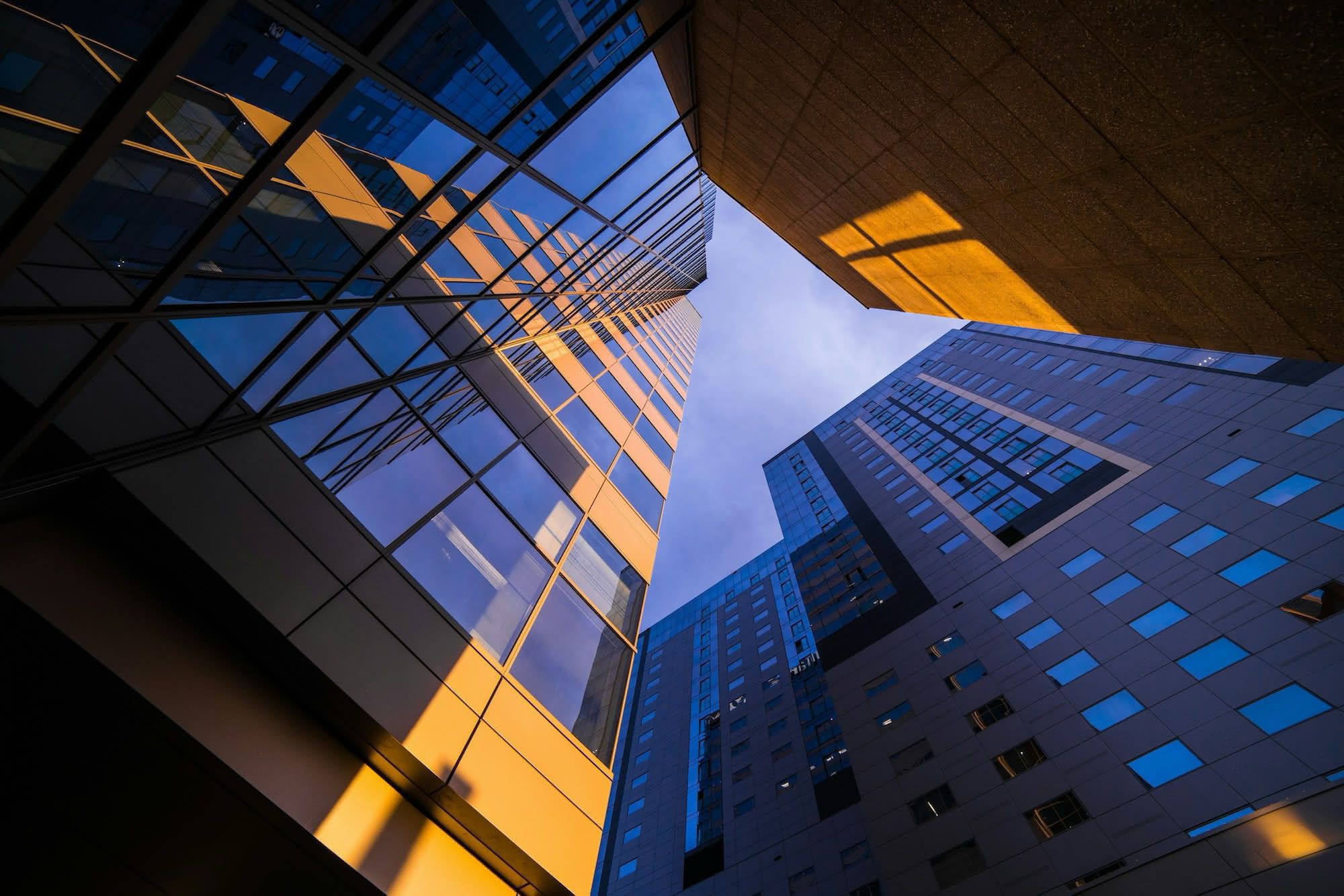 Looking up at high-rise buildings